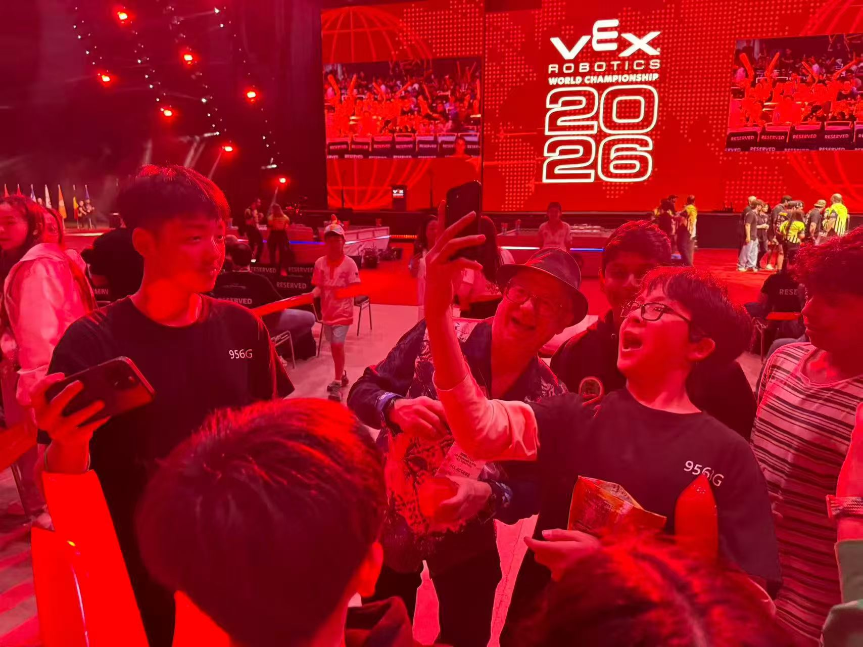 Team celebrating with awards